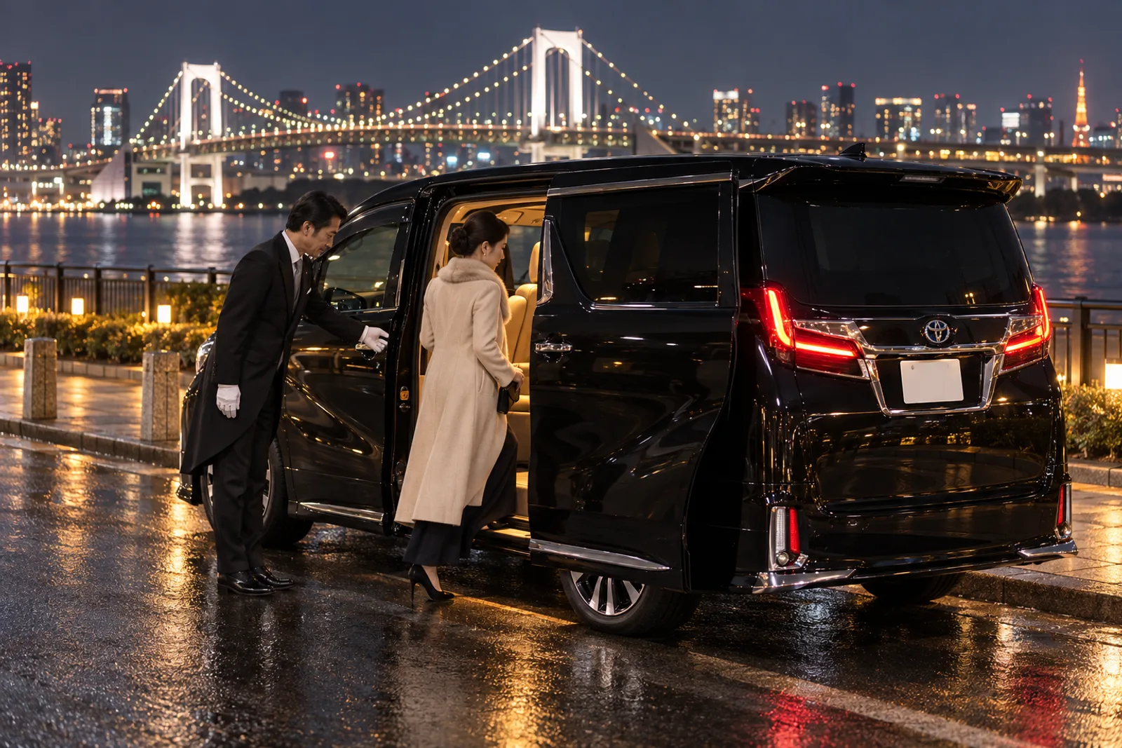 A butler opening a car door to welcome a guest